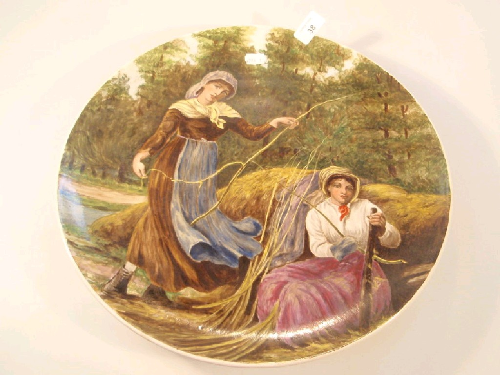 A late Victorian pottery circular plaque painted with a study