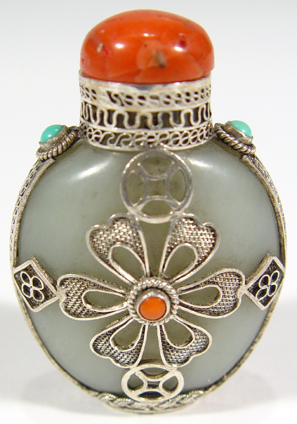 Chinese Celedon jade snuff bottle with white metal mount and