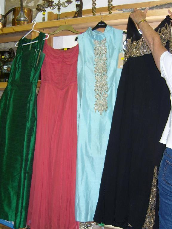 A collection of four 20th century evening dresses including a