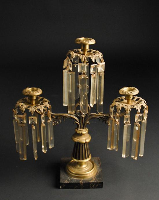A Triple Branch Lustre of brass with acanthus branch arms