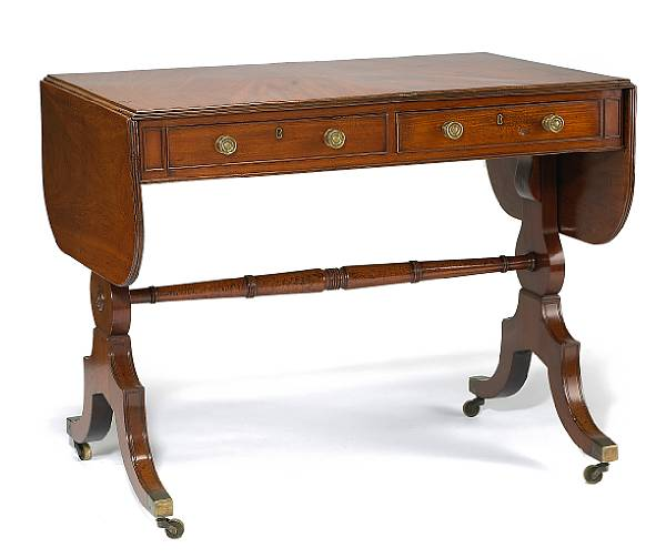Furniture The hinged rectangular top over two drawers raised on