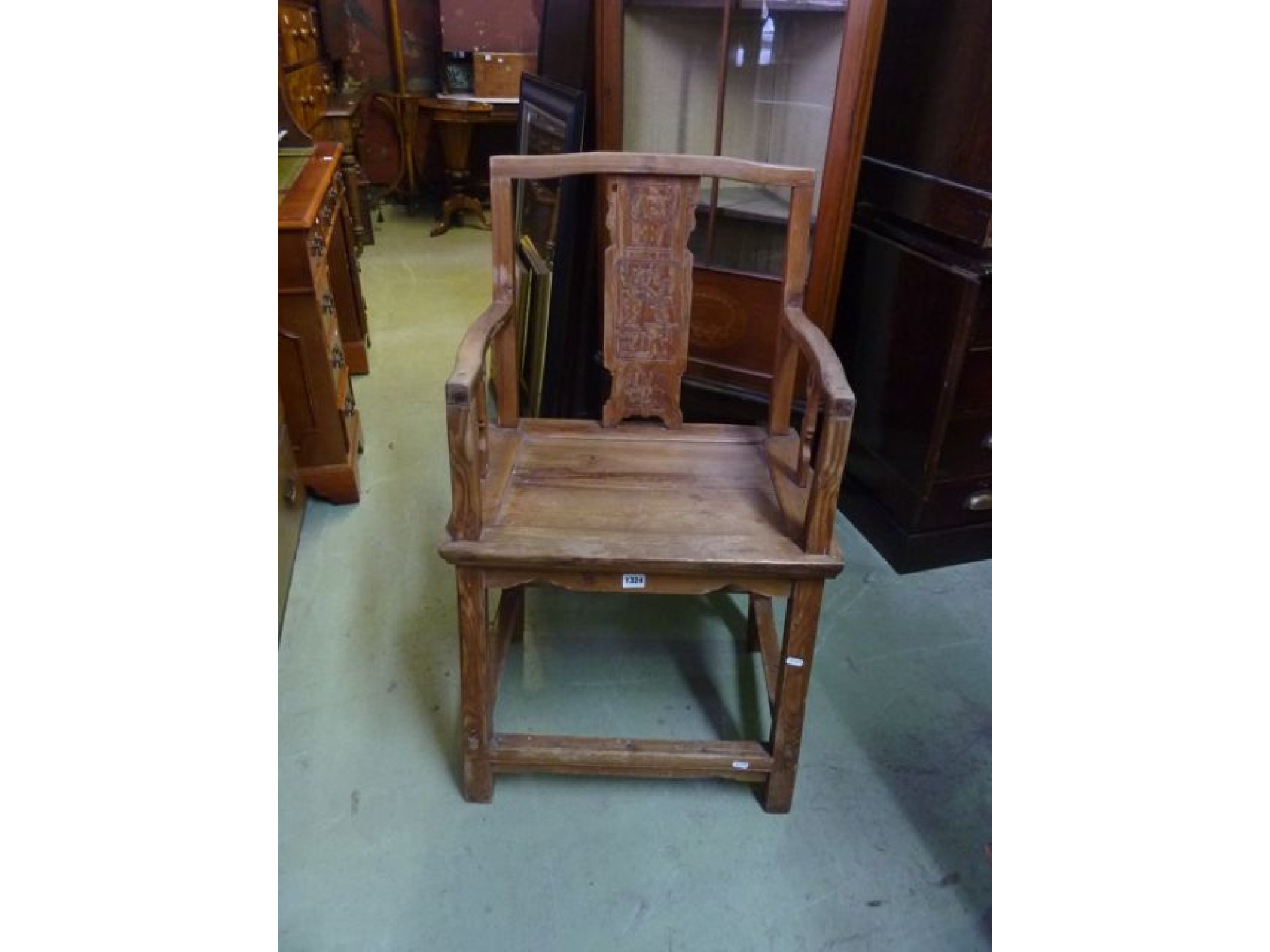 A vintage Chinese elbow chair with stripped pine frame the