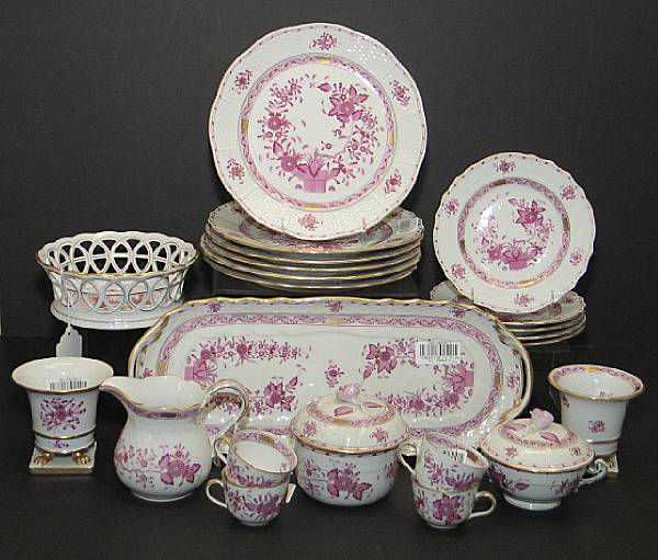 A Herend porcelain dinner service in the Indian Basket pattern
