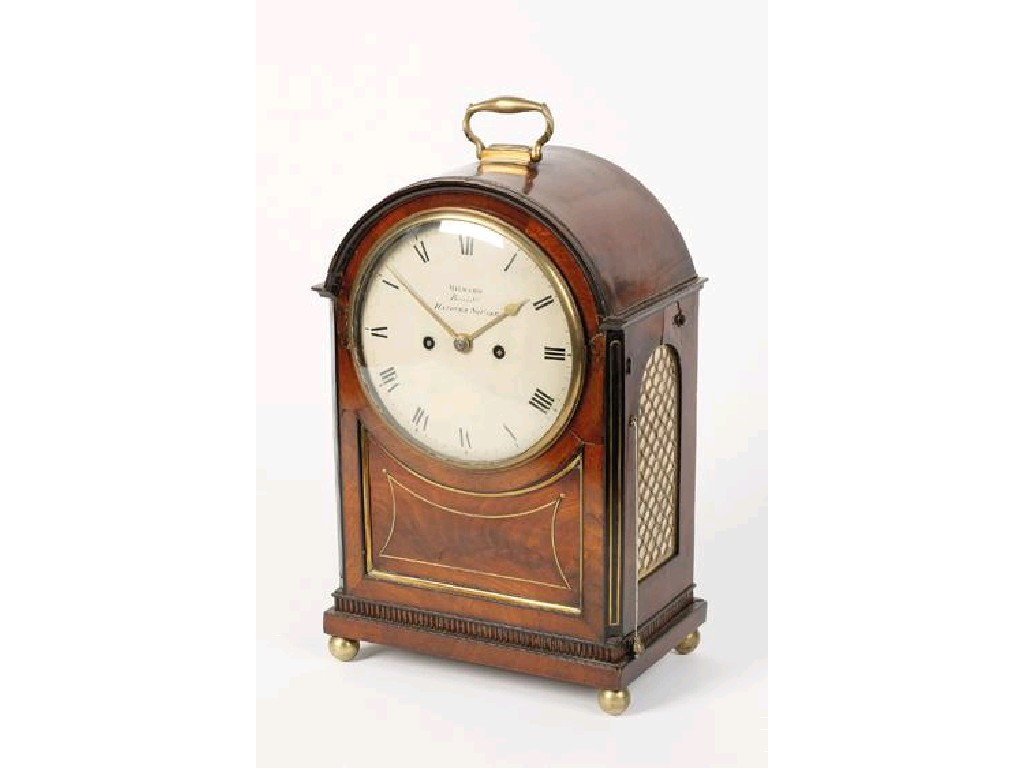 A REGENCY MAHOGANY AND BRASS INLAID BRACKET CLOCK the white