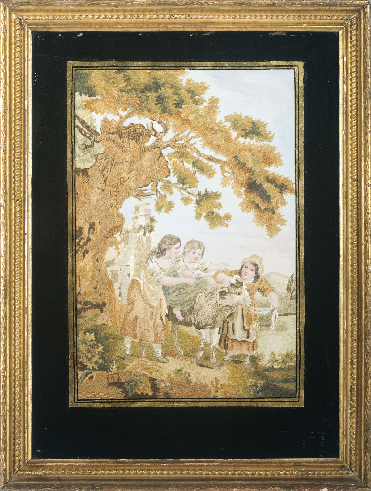FRENCH NEEDLWORK OF CHILDREN PLAYING WITH A PET DONKEY In