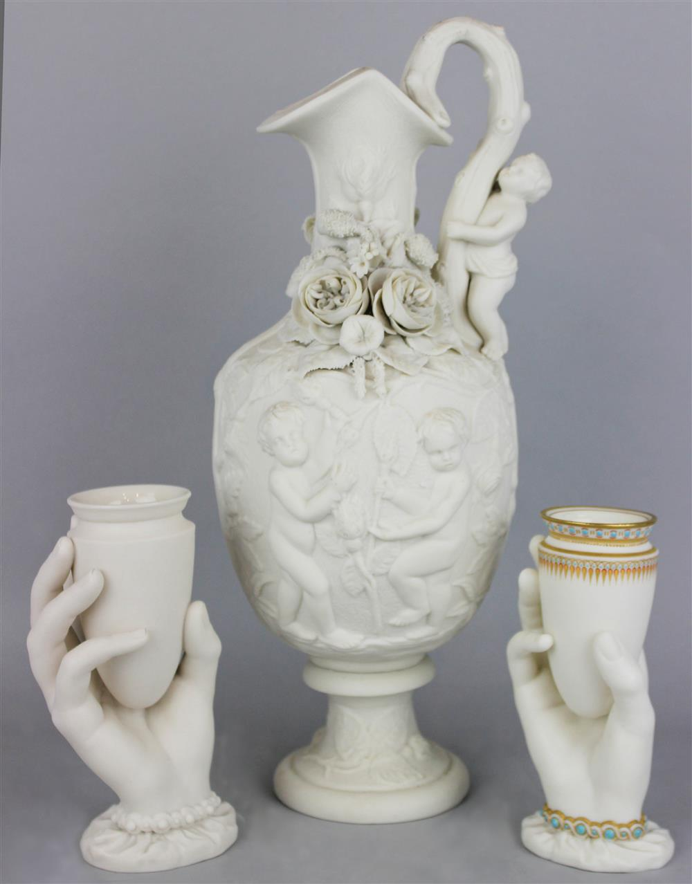 TWO ROYAL WORCESTER PARIAN HAND VASES the first with green