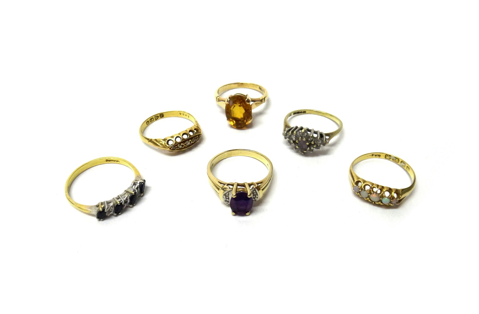 An 18ct gold and diamond set five stone ring in
