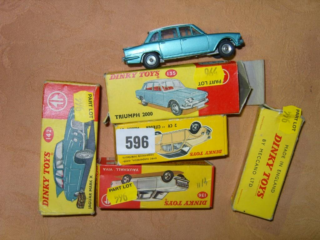 A collection of five boxed Dinky cars comprising Triumph 2000