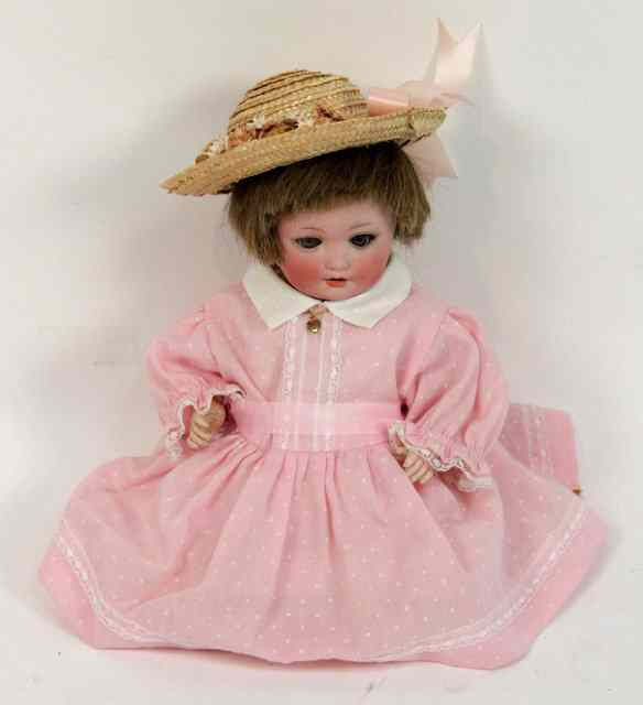 An Armand Marseille doll 985 A 5 0 M 25cm