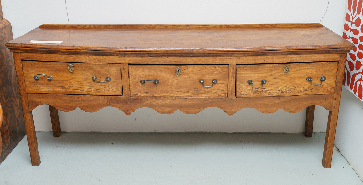A 19th CENTURY ENGLISH OAK DRESSER Three central drawers with