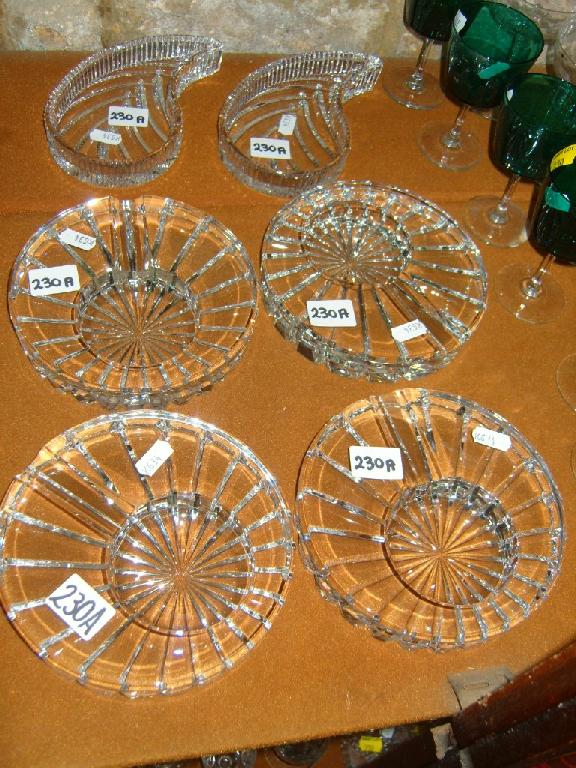 A set of four Waterford crystal ashtrays of circular form