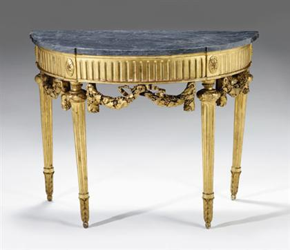 Louis XVI giltwood console circa 1780 The demilune top with