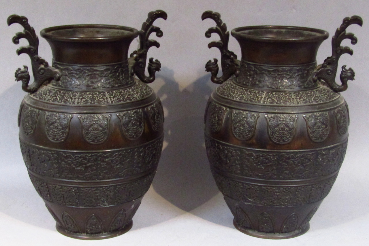 A pair of 19thC bronze vases of large proportion the