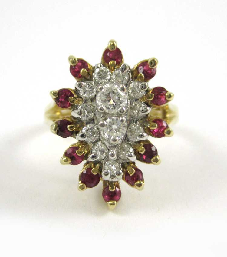 DIAMOND RUBY AND FOURTEEN KARAT GOLD RING with twelve round