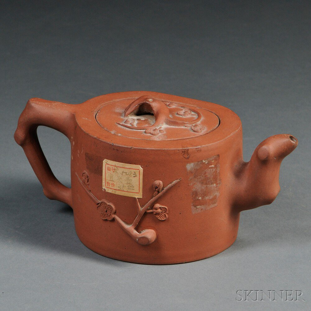 Yixing Teapot China 20th century irregular shape with branch form