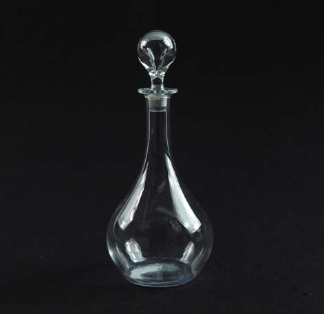 SIGNED BACCARAT DECANTER Bulbous clear blown glass decanter is topped