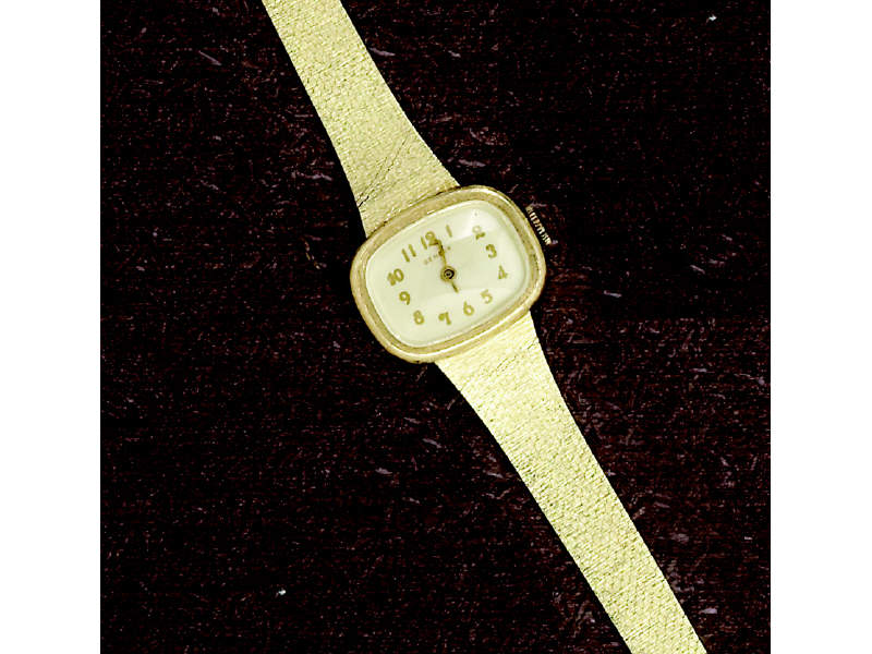 LADY S GOLD WATCH 14k yellow gold Geneve manual wind