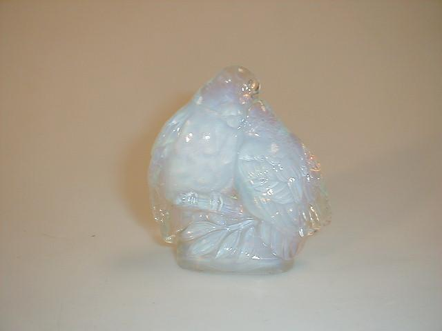 A Joblin opalescent pressed glass ornament of entwined lovebirds registration