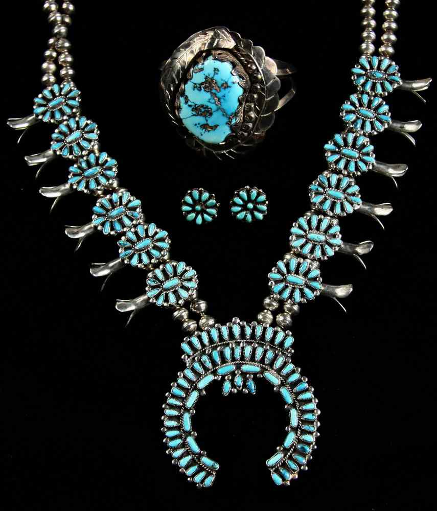 NAVAJO JEWELRY A sterling and turquoise bracelet with leaf design