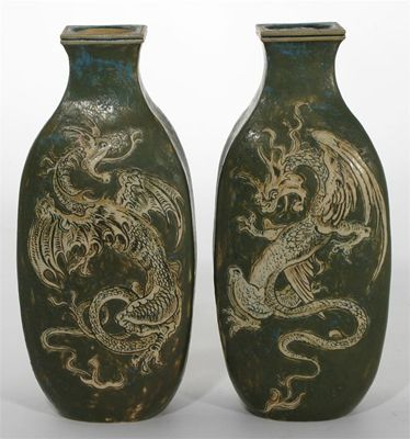 A pair of Martin Brothers stoneware dragon vases slab form