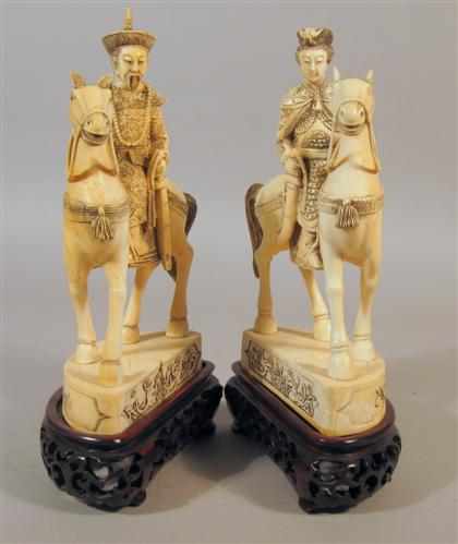 Fine pair of Chinese elephant ivory figures Well carved male