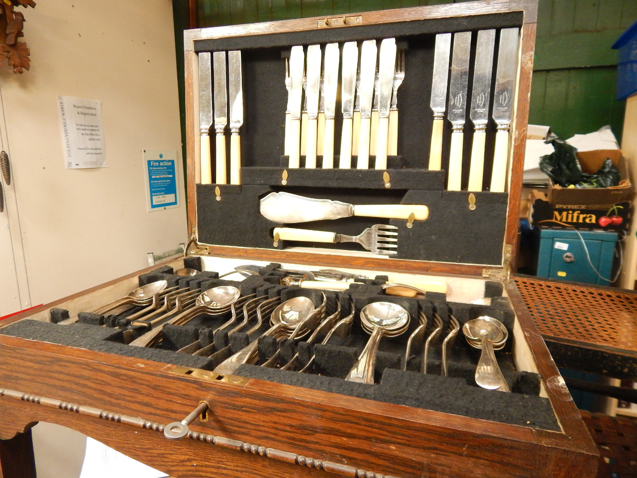 An oak canteen of Old English pattern silver plated cutlery