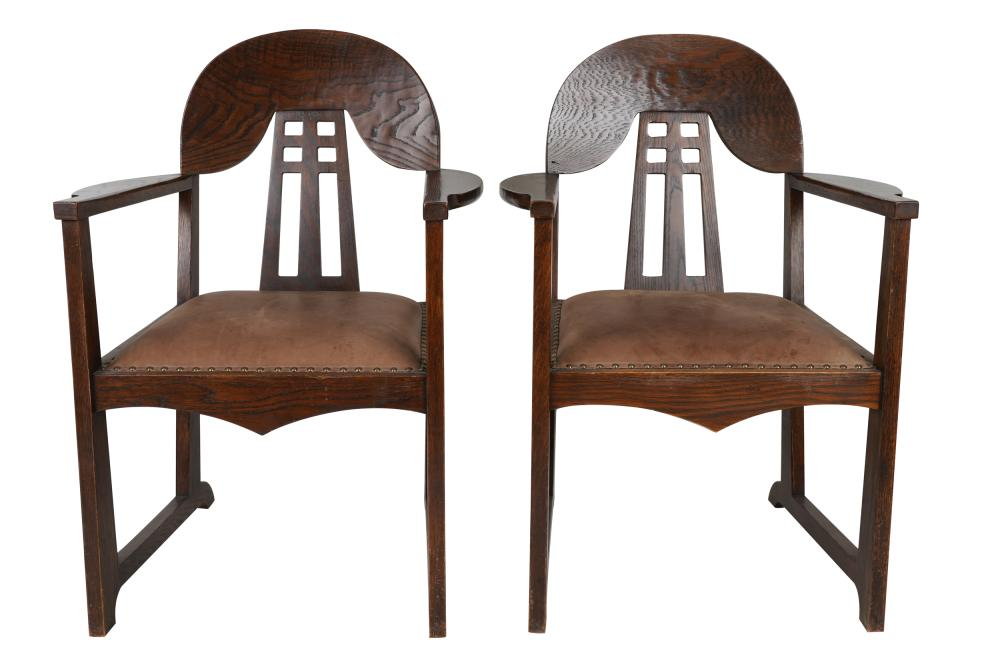 PAIR OF ARTS CRAFTS STYLE OAK OPEN ARMCHAIRSunsigned the seats