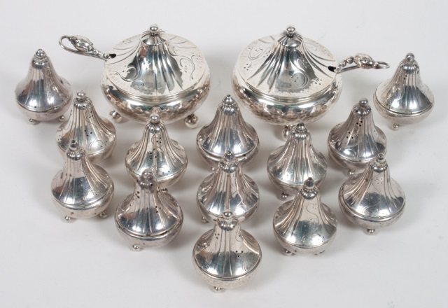 Thirteen Georg Jensen sterling silver shakers together with a pair