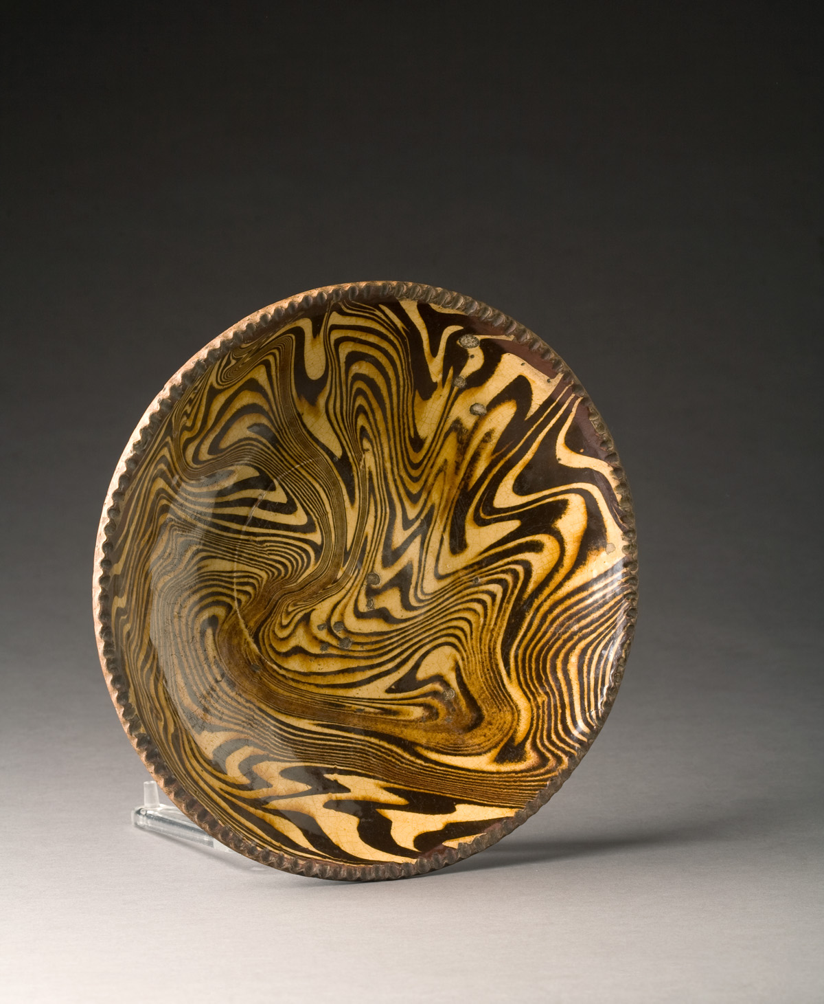 ENGLISH REDWARE SLIP DECORATED DISH LATE EIGHTEENTH EARLY NINETEENTH CENTURY