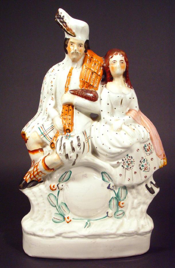 Large hand painted Staffordshire flat back group a Scotsman and