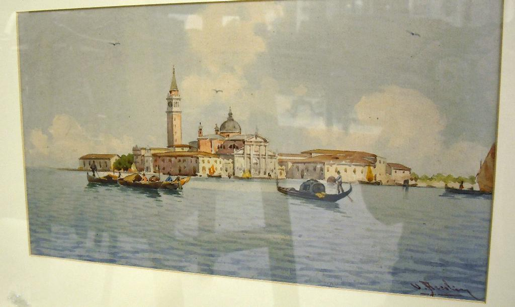 By U Arcolini 20th century view of Venice with gondolas