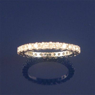 A diamond full circle eternity ring set with brilliant cut