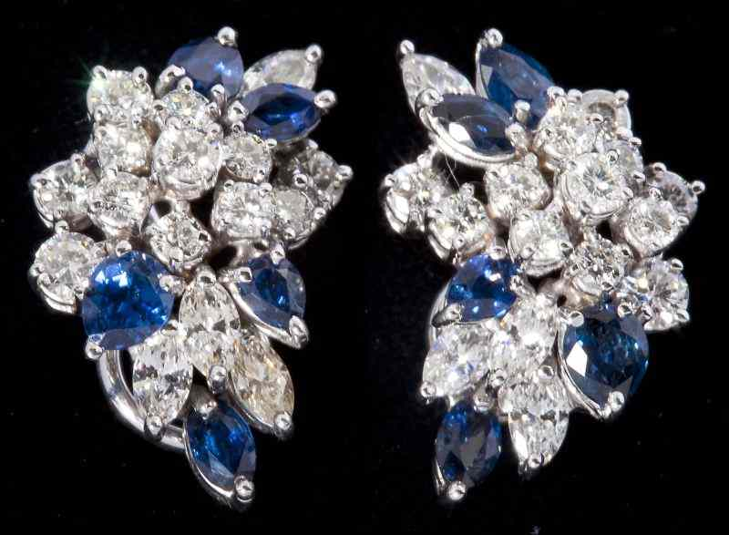 Diamond and Sapphire Earclipscluster set in white gold in leaf