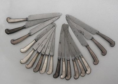 Three sets of six early eighteenth century table knives with