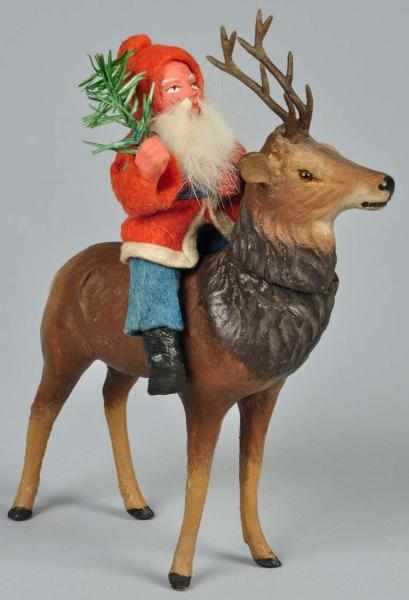 Santa Riding Composition Reindeer Candy Container Description Glass eyes and