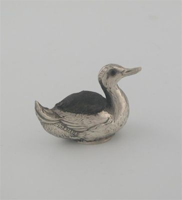 An Edwardian duck glass eyes makers mark partially worn Bros