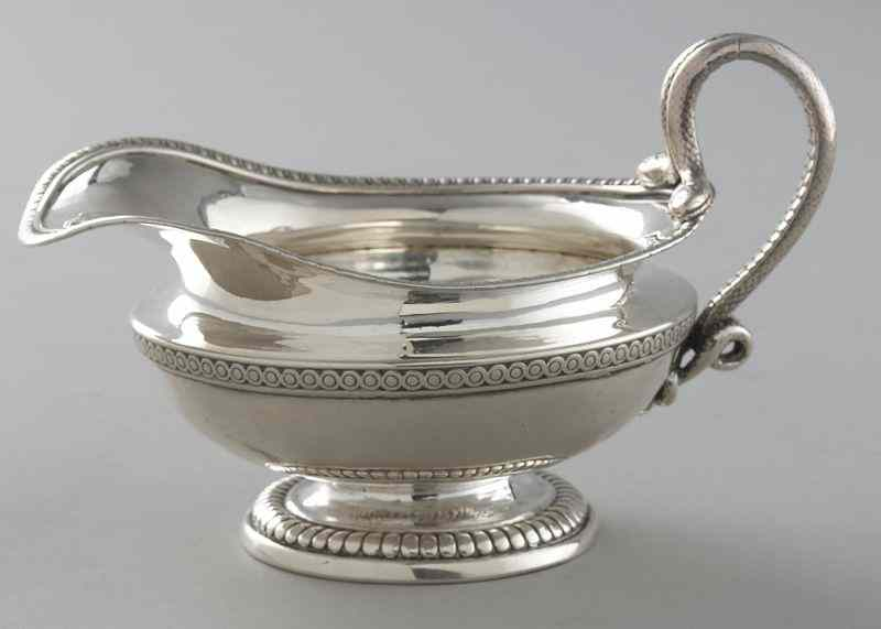 Paul Storr sterling silver creamerhaving a gadrooned rim and double
