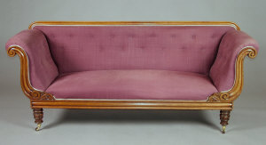 An early Victorian mahogany double scroll ended settee the moulded
