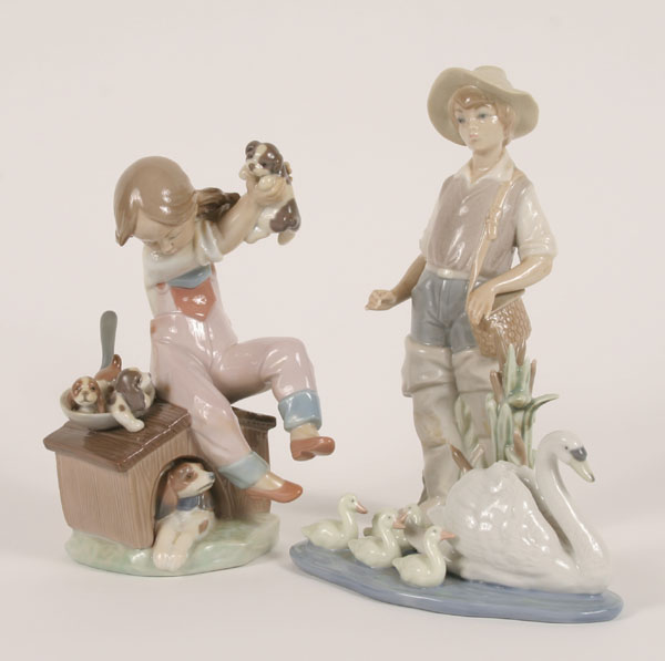 Lladro figures floating swan with babies little girl with puppies