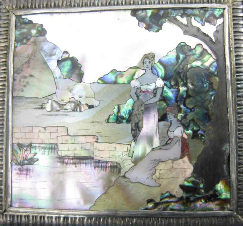 A silver framed square Brooch set mother of pearl engraved