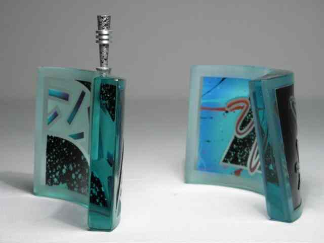 Two art glass cologne bottles by Irving Glass Design Both