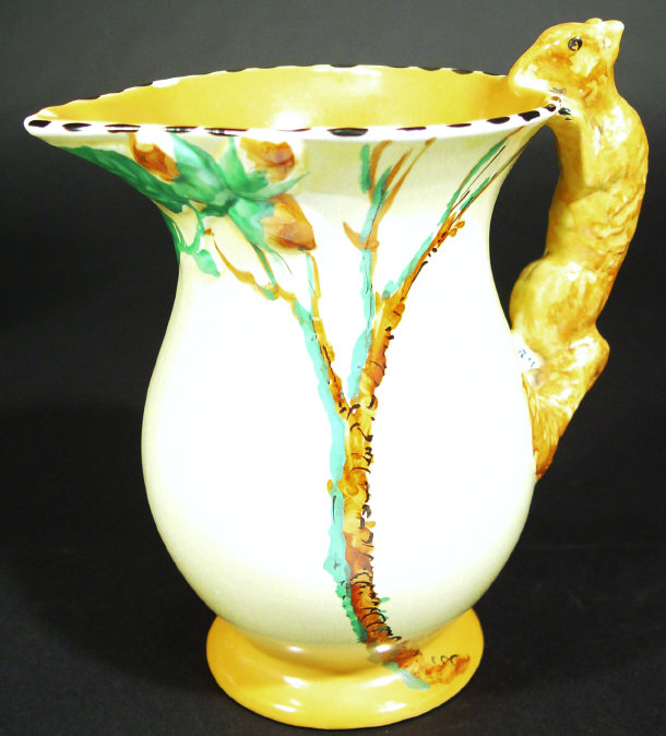 Burleighware jug modelled with a squirrel handle and hand painted