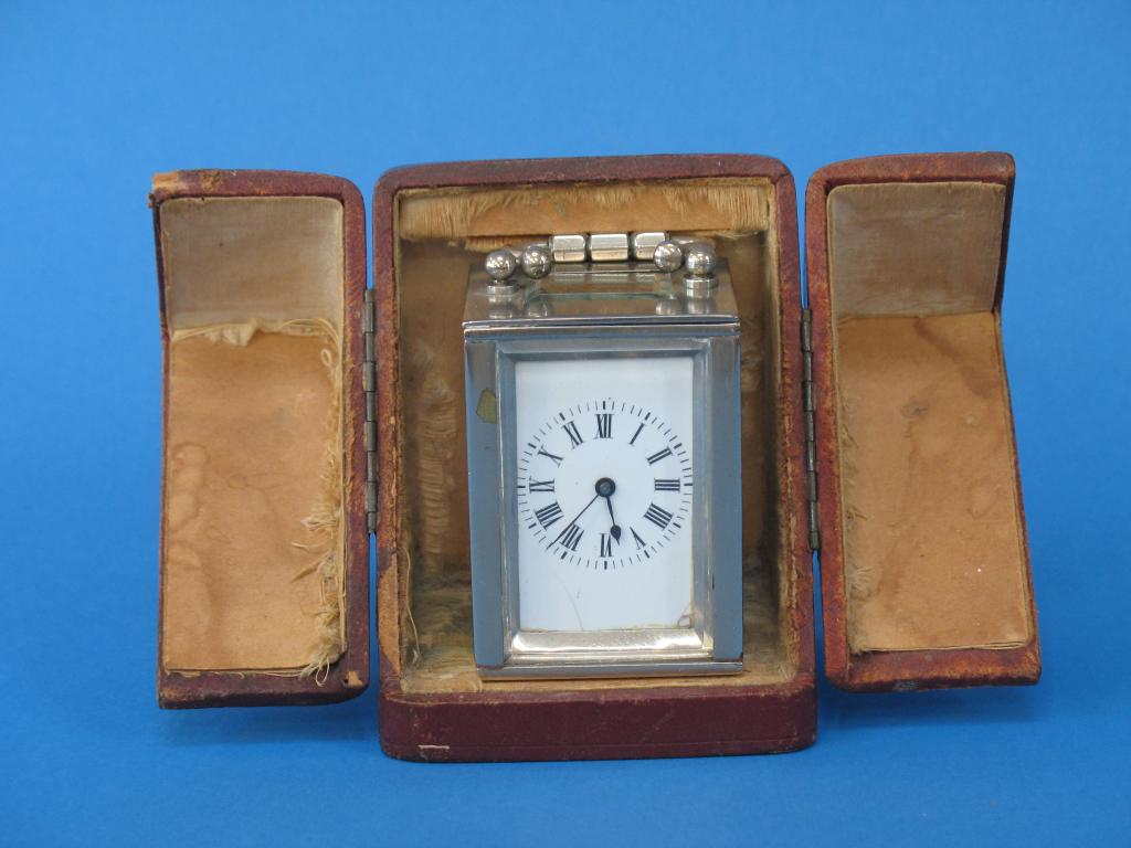 A MINIATURE FRENCH CARRIAGE TIMEPIECE in plated case the white