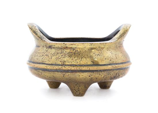 Sale 397 Lot 534 A Gilt Bronze Tripod Censer the