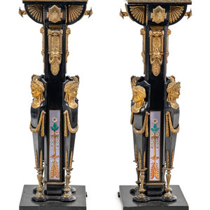 A Pair of Egyptian Revival Gilt Bronze and Porcelain Mounted