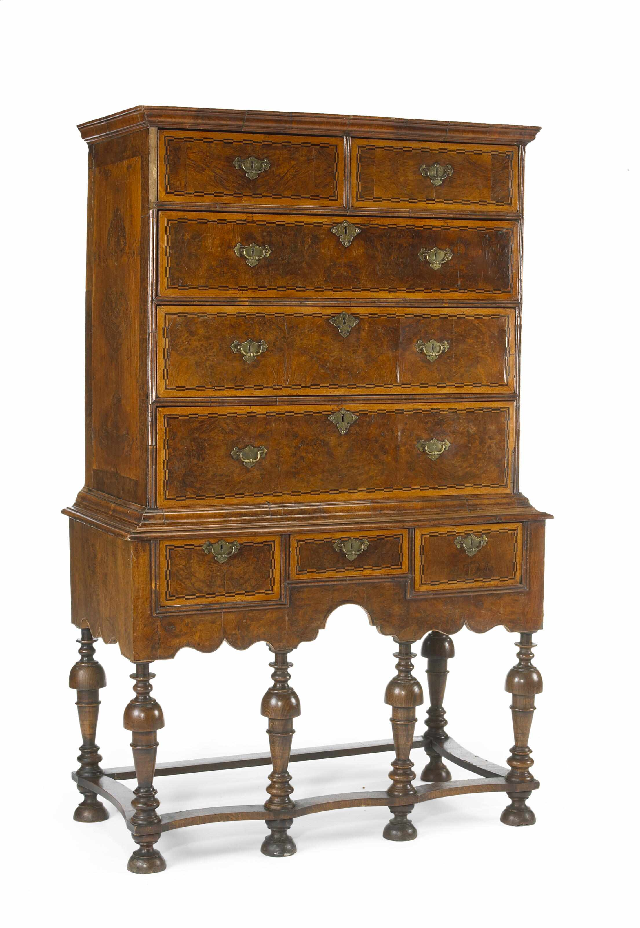 A William and Mary crossbanded walnut chest on stand late