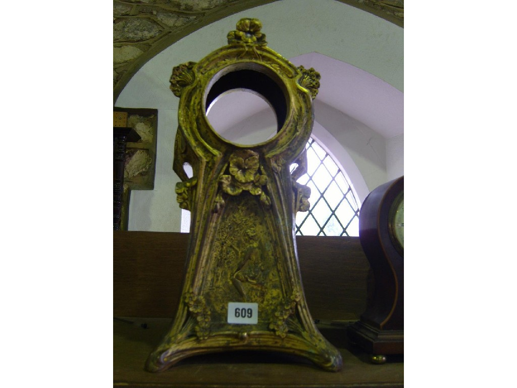An Art Nouveau Spelter clock case of highly stylised form