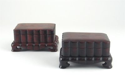 Two Chinese hardwood small rectangular boxes stands and lids each