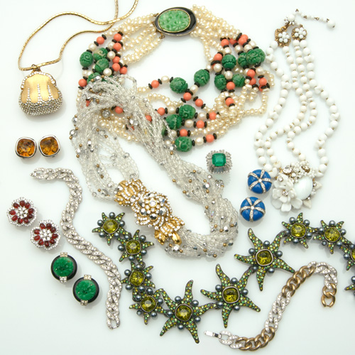 Sixteen pieces of designer costume jewelry all late 20th C