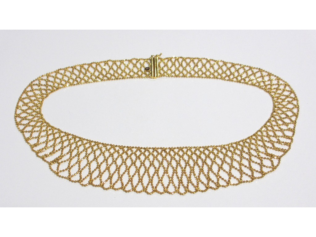 A nine carat gold openwork collar with linked micro beads